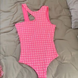 Pink fashion nova body suit. Size small